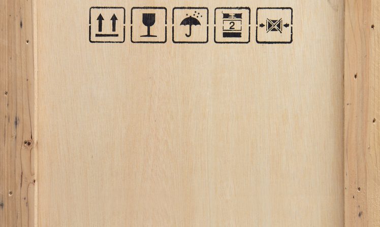 A wooden packing crate containes fragile goods, for safe transportation by World Courier Express