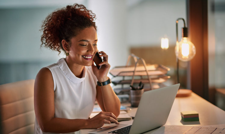 young businesswoman taking a phone call